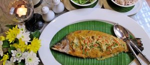 Pla Ob Khing Tao Jiew by Chef Darren Wiper at Mom Tri’s Villa Royale, Kata — baked sea bass with yellow bean curry and sautéed morning glory.