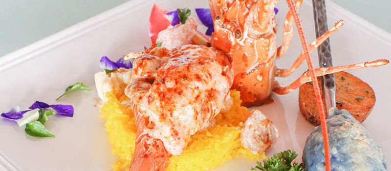 Phuket Lobster Thermidor by Chef Sanit Thavinporn at @ Beach Bar & Restaurant, Karon — flambéed lobster with mushrooms, cream, and saffron rice.