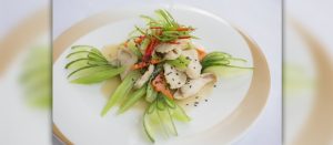 Chicken with Spring Onion by Chef Apichat at Ocean Beach Club, Hilton Phuket Arcadia — tender chicken stir-fried with celery, spring onion, and ginger.