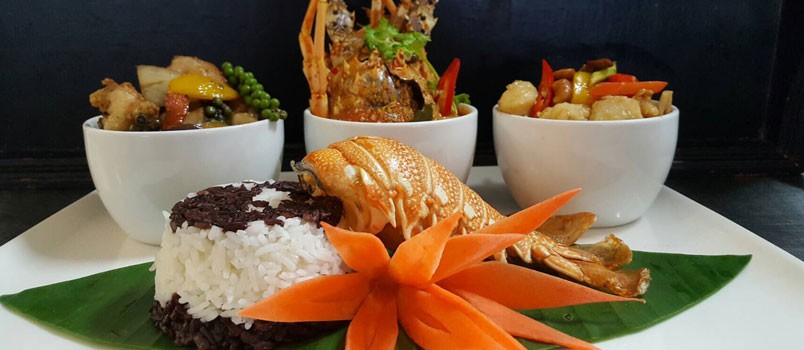Phuket Lobster Trilogy by Chef Kitti Saelhue at Boathouse Wine & Grill, Kata — Thai lobster prepared three ways with lemongrass, chilli, and herbs.