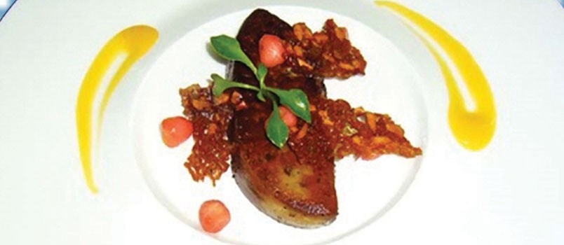 Pan-Seared Goose Foie Gras by Chef Kritsakorn Pakdeevirote at The 9th Floor, Patong — served with mango emulsion, caramelised apples, and sweet almonds.