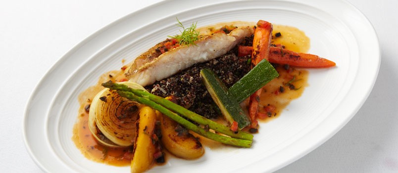 Pan-Fried Grouper by Chef Weerayut “Oudi” Utedpornratanakul at Senzees, Eastin Yama Hotel, Kata — crispy grouper with black quinoa, vegetables, and Provencal sauce.