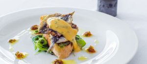 Grilled Sardines with Salsa Verdi by Chef Steve Baker at Kata Rocks, Kata — fresh sardines on ciabatta with roast garlic aioli and vinaigrette.