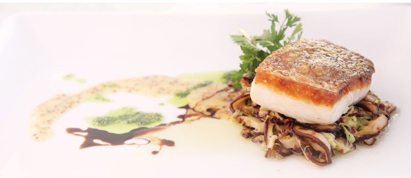 Pan-Seared Phuket White Snapper by Chef Aaron Hooper at Joe’s Downstairs, Kalim — crispy snapper with shiitake bacon ragout and arugula pesto.