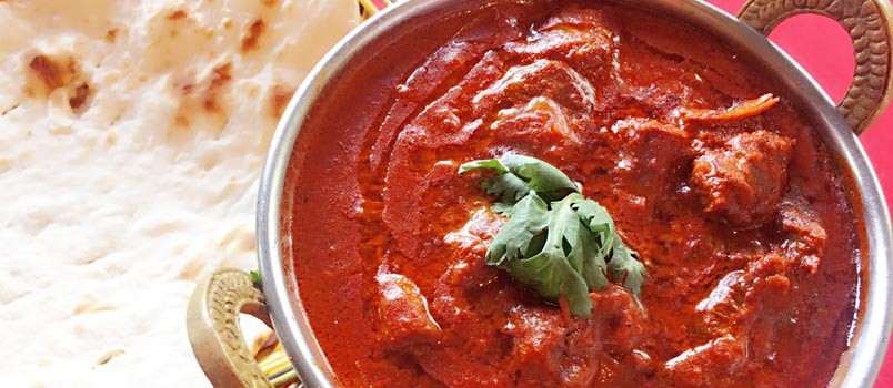 Mutton Rogan Josh by Chef Kamal Singh at Baluchi Restaurant, Phuket — slow-cooked mutton curry with Indian spices and yoghurt.