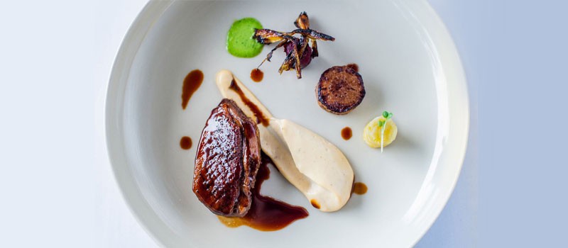Seared duck breast with cauliflower onion soubise and red wine glaze by Chef Franko at Paresa Resort, Kamala.
