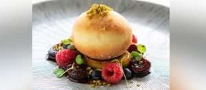 The Foie Gras Doughnut by Chef Rey at The Pavilions, Cherngtalay, Phuket — seared foie gras with caramelized cherries, brioche doughnut, and veal jus