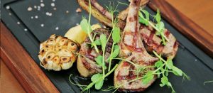 Costolette di Agnello alla Griglia by Chef Marco Cacia at Bodega & Grill, Angsana Laguna Phuket — grilled lamb chops served with baby potatoes, cherry tomatoes, and rosemary jus.