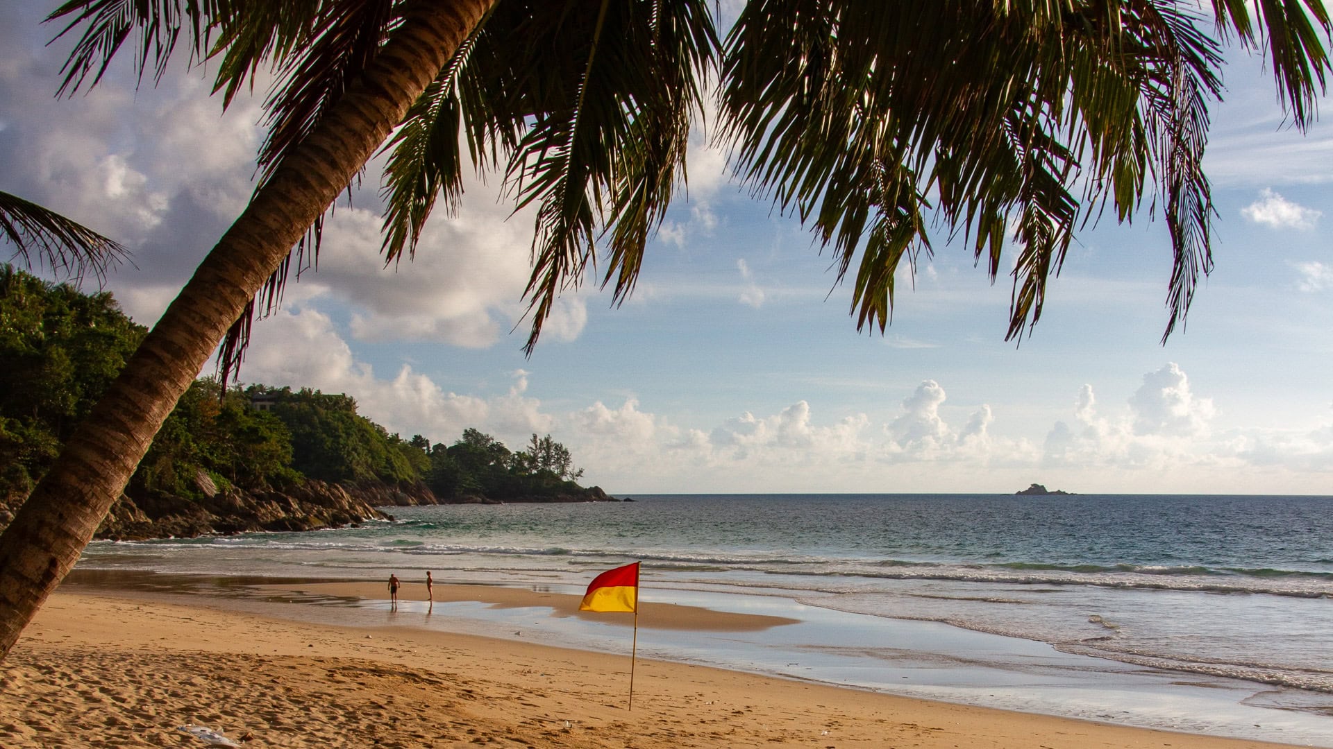 White Beach Phuket resort terrace and greenery overlooking the quiet beach.
