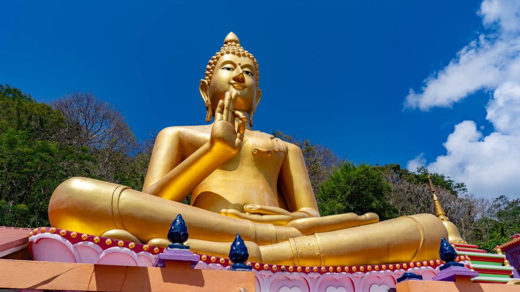 Large golden seated Buddha statue at Wat Khao Rang Samakkhitham Phuket