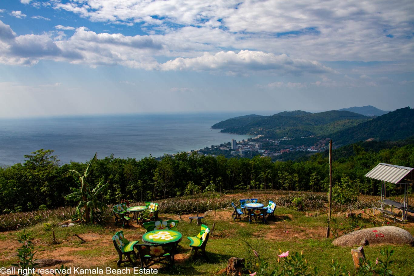 West-coast view from Nakkerd Hill with painted café tables