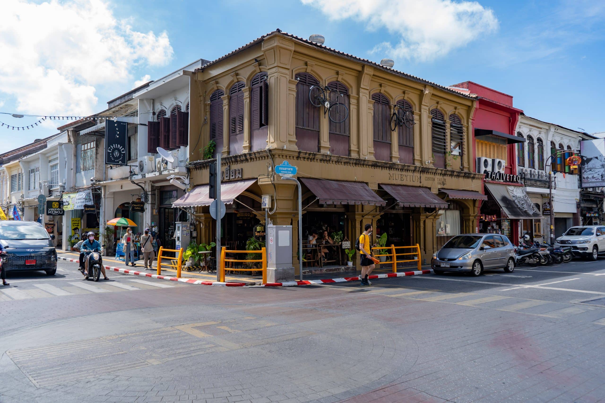 Historic corner shophouse on a busy Phuket Old Town street
