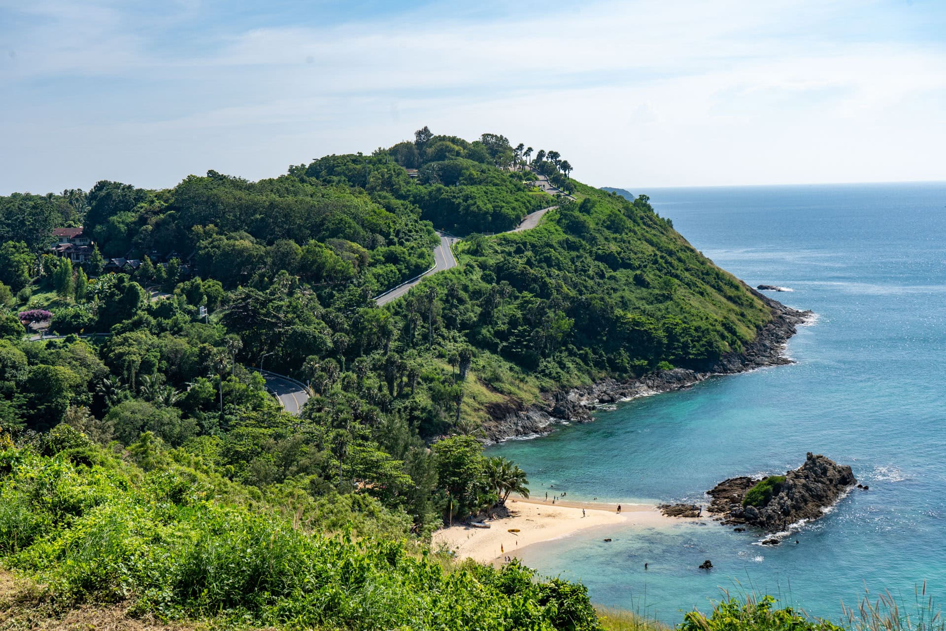 Coastal road, small beach and headland viewed from Windmill Viewpoint