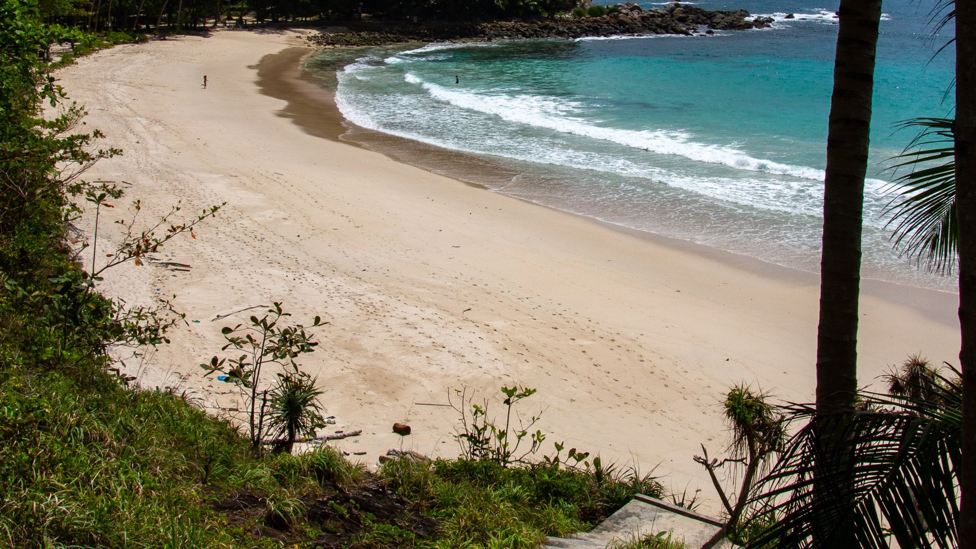 Freedom Beach Phuket viewed from hillside with empty sand and gentle waves