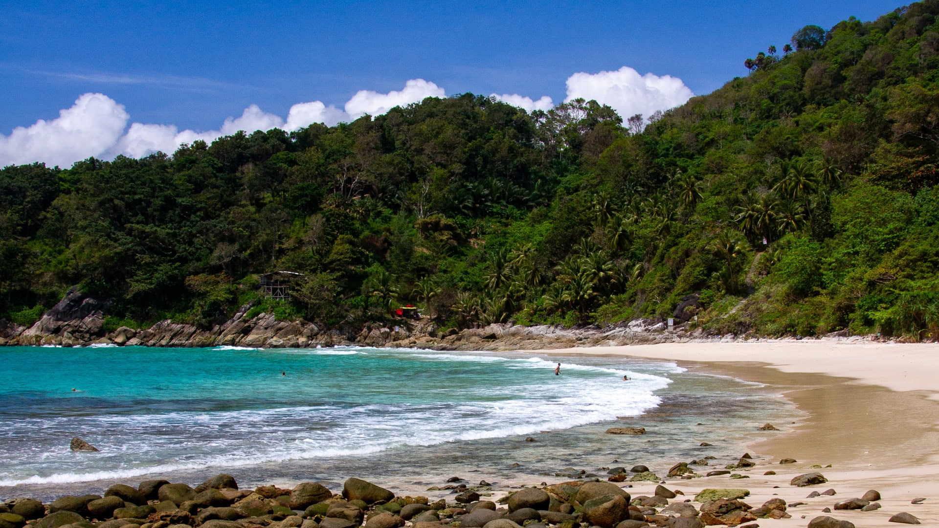 Freedom Beach Phuket wide view of sandy beach and jungle-covered hills