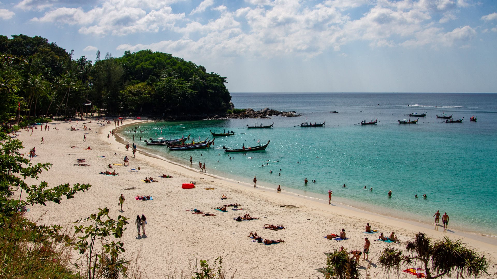 Freedom Beach Phuket rocky shoreline with clear turquoise water