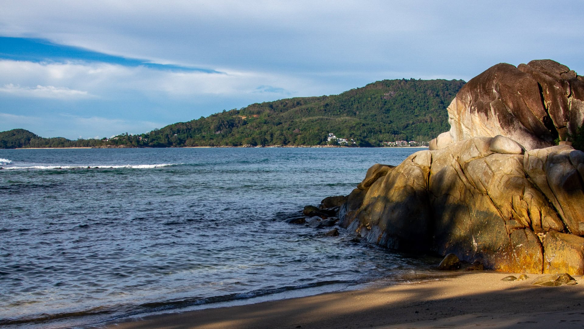 Hua Beach Phuket with elephants standing in shallow water near the shore
