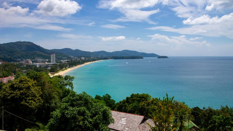 Panoramic view of Karon Beach Phuket from an elevated viewpoint.