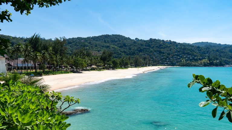 Elevated view of the curved bay at Kata Noi Beach Phuket.