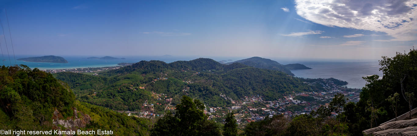 Panoramic view across forested hills and Phuket coastline from Nakkerd Hill